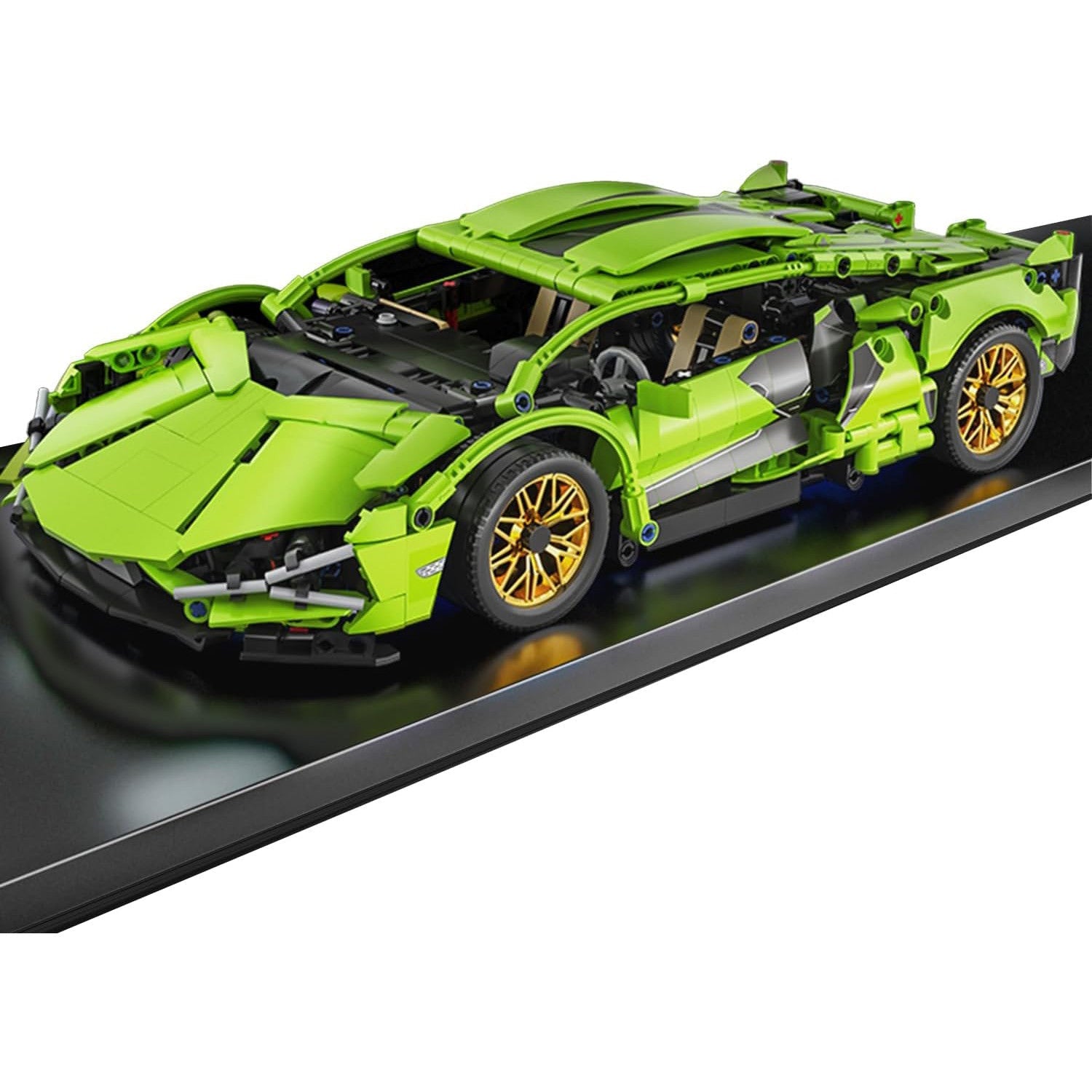 Green sports car model on a black platform with a white background